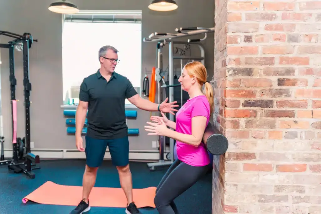 a man and woman in a gym